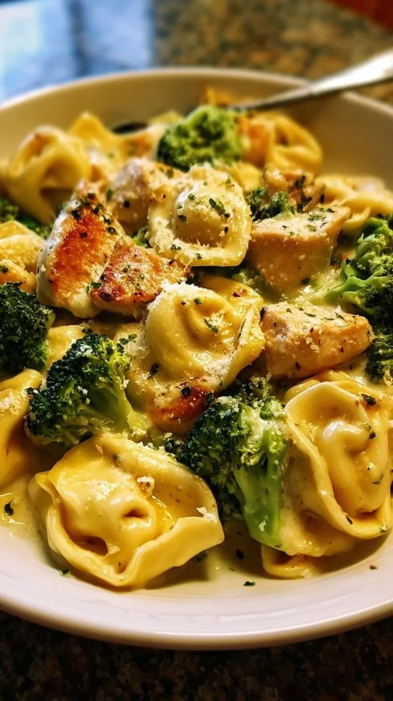 Garlic Parmesan Tortellini with Chicken and Broccoli served in a bowl