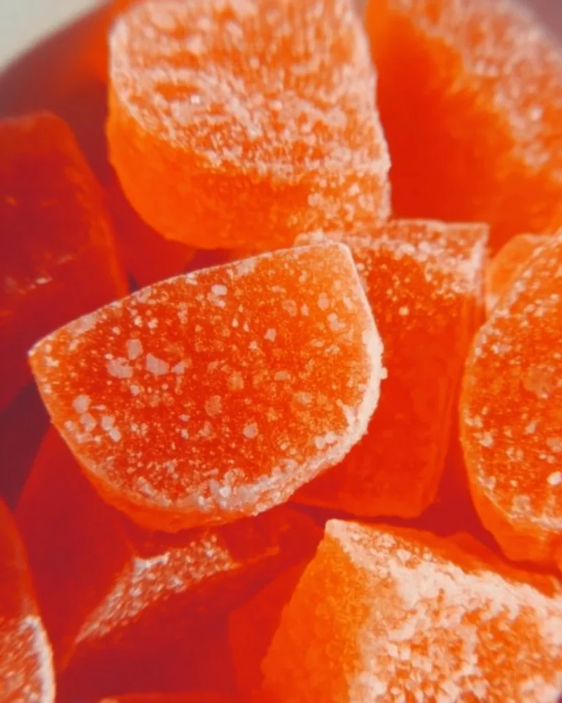 Delicious old fashioned orange candy displayed in a charming glass jar