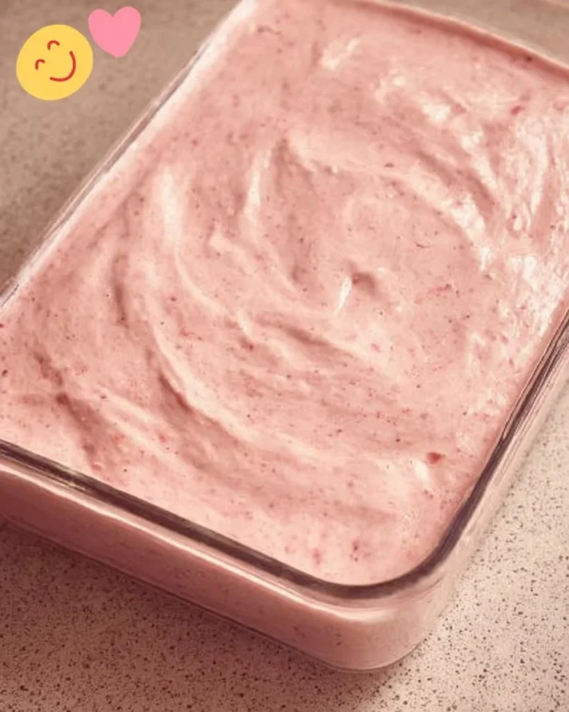 Best ever strawberry cake topped with fresh strawberries and whipped cream