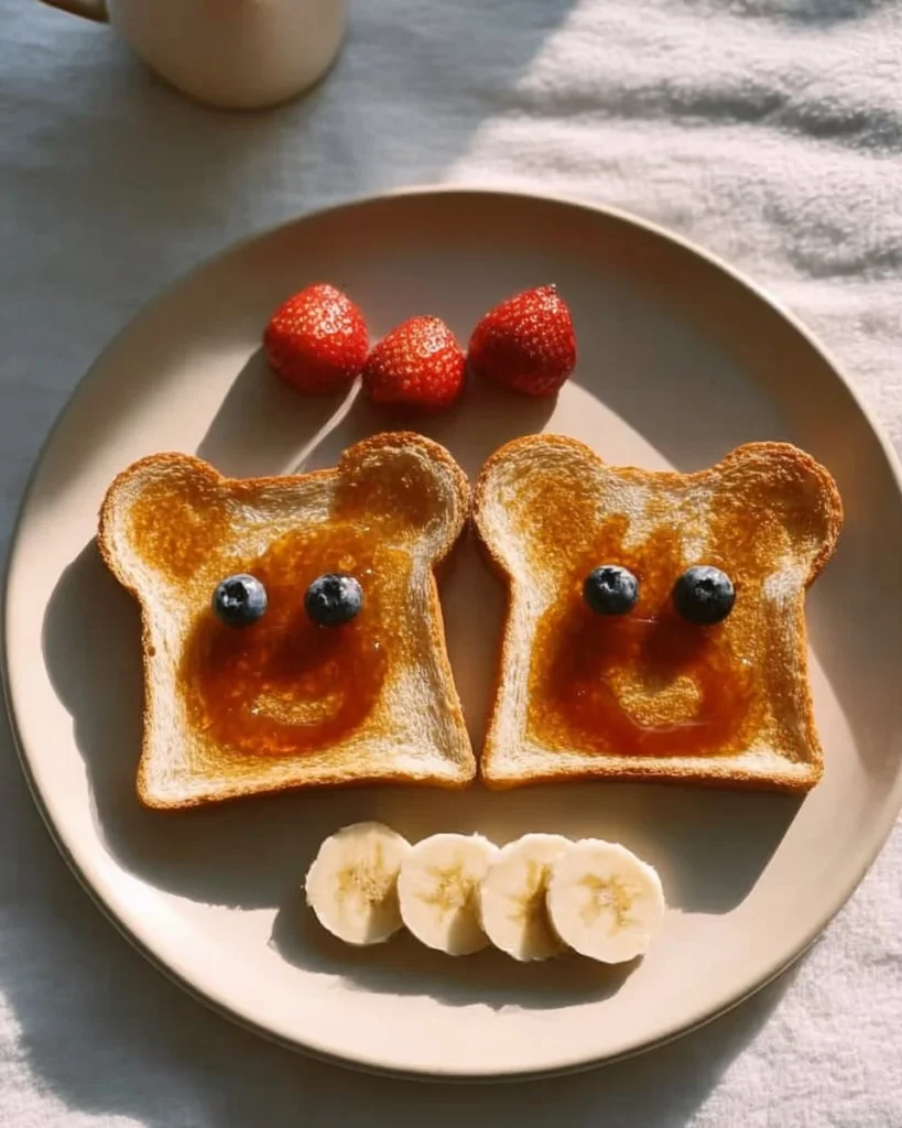 Delicious Bear Toast breakfast themed for kids, featuring fun bear shapes and toppings.