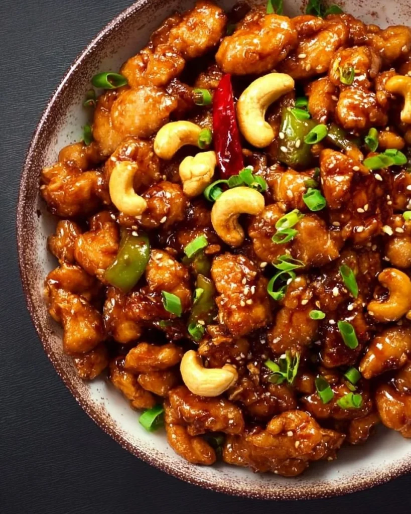 Plate of easy authentic cashew chicken with vegetables and rice