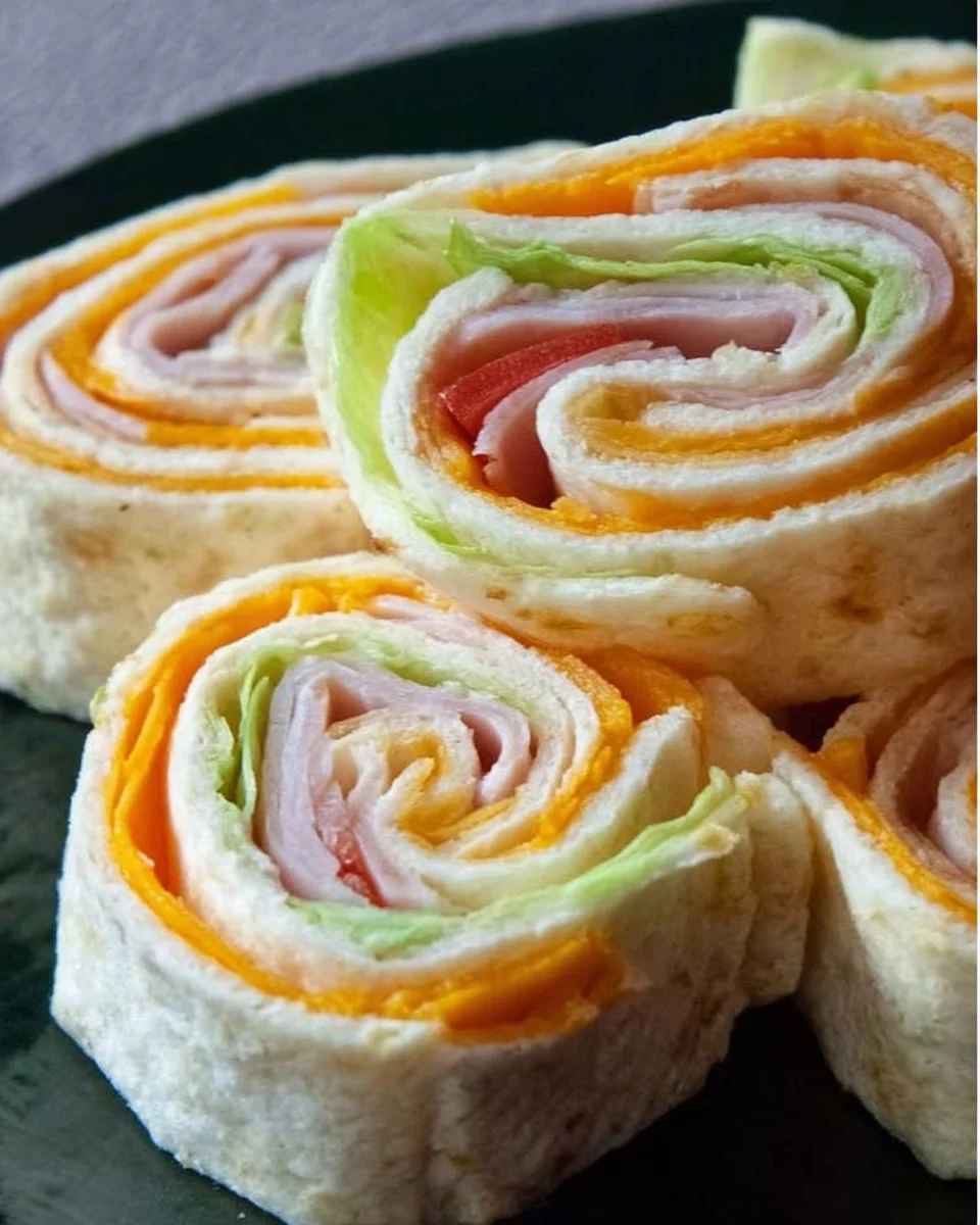 Turkey Cheddar Lunch Roll Ups on a plate