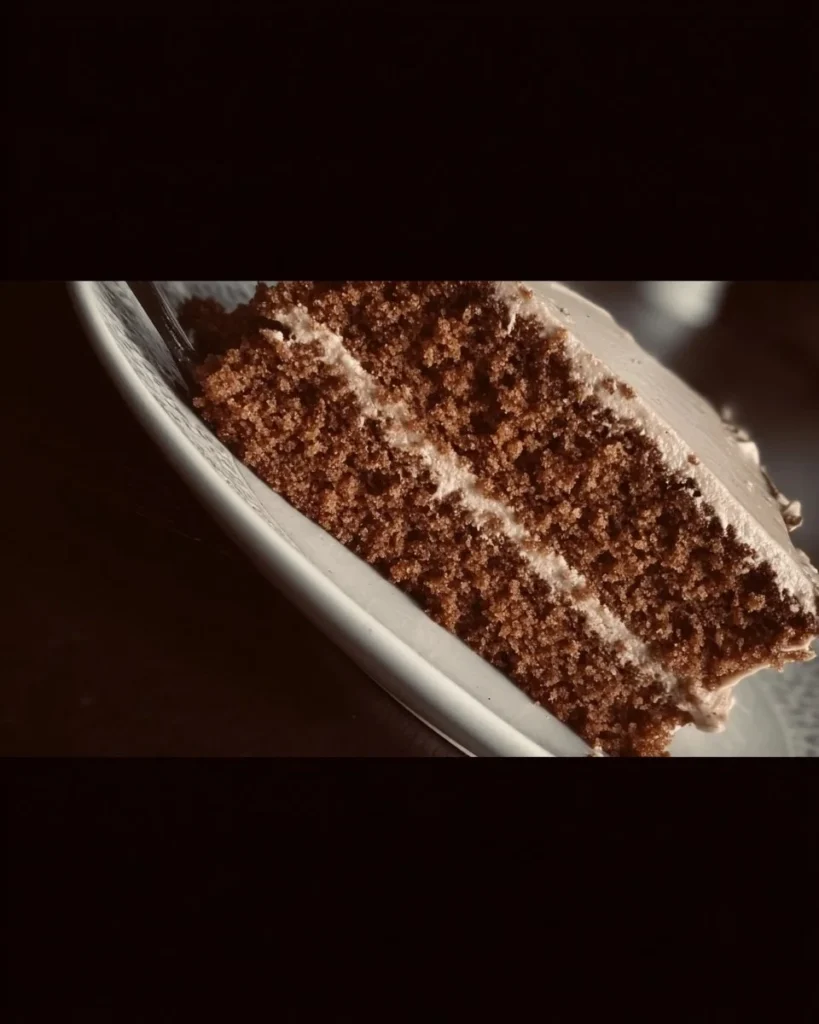 Gingerbread Cake with Cinnamon Molasses Frosting on a decorative plate