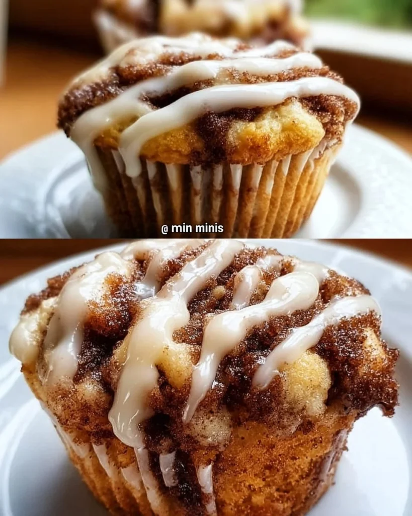 Delicious homemade cinnamon roll muffins with icing on a white plate.