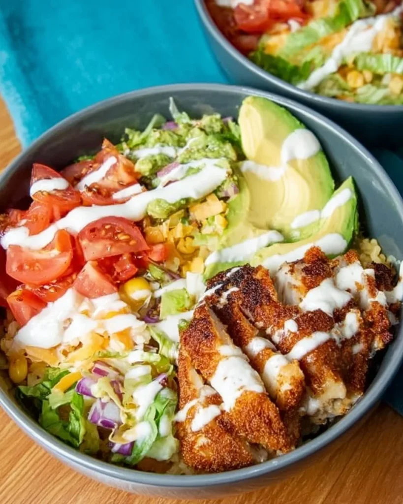 Low carb fish taco bowl topped with fresh ingredients and herbs