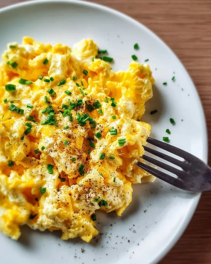 Delicious protein-packed cottage cheese scrambled eggs served on a plate