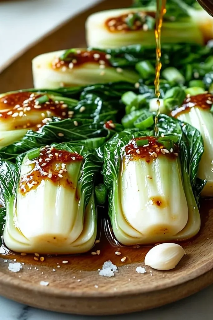 Bok Choy stir-fried with ginger and chili sauce on a plate