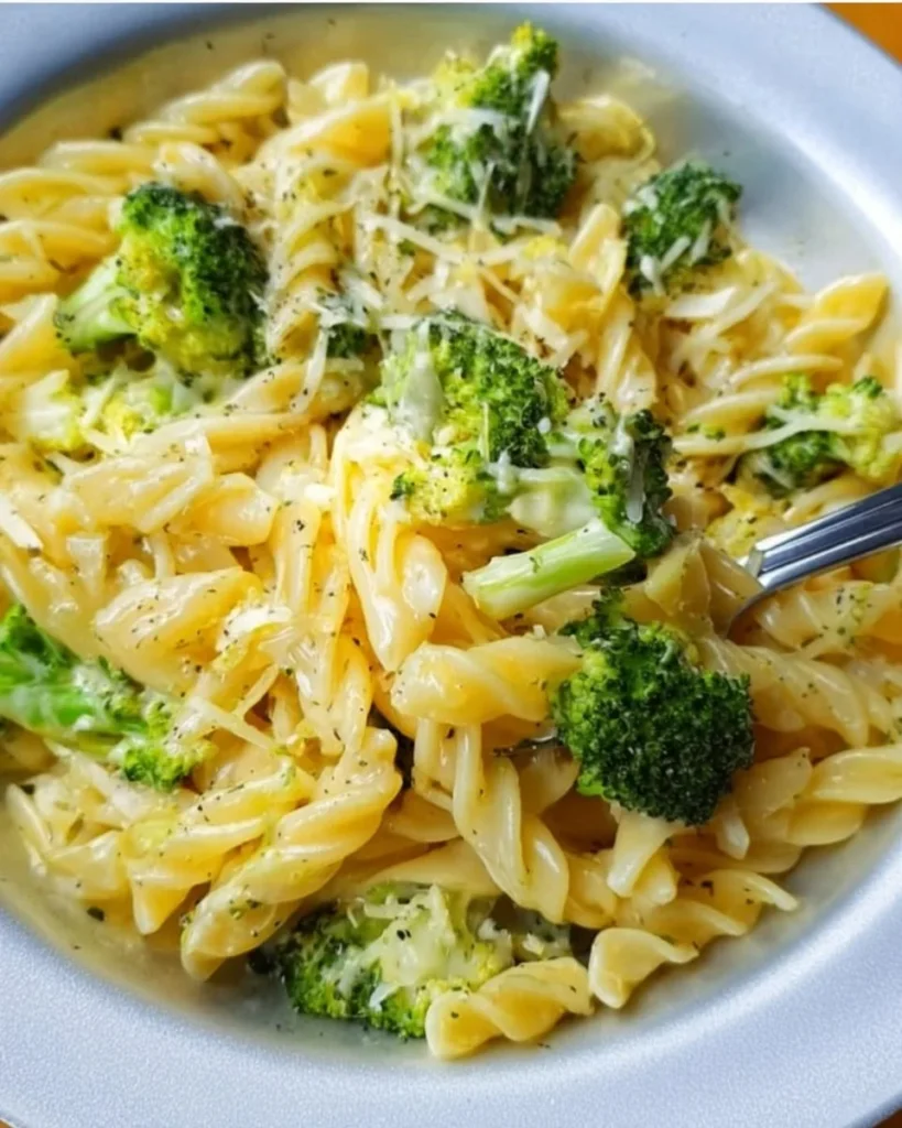 Creamy lemon broccoli pasta dish served in a bowl with fresh broccoli