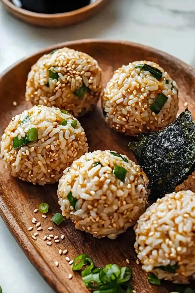 Delicious Korean rice balls filled with savory ingredients and wrapped in seaweed.
