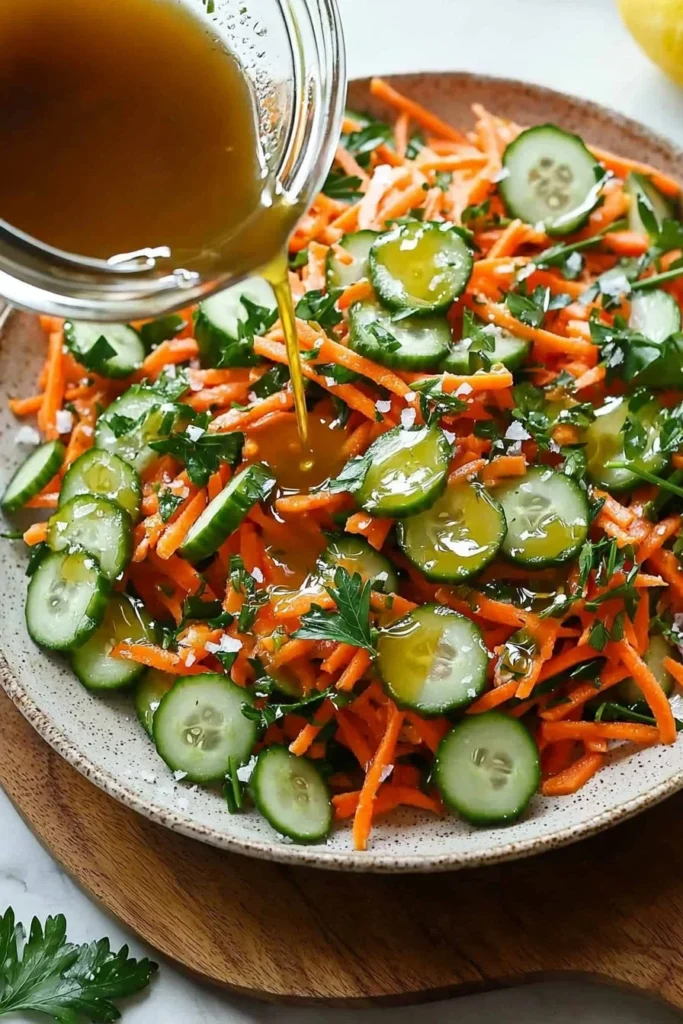 Healthy carrot cucumber salad with fresh vegetables